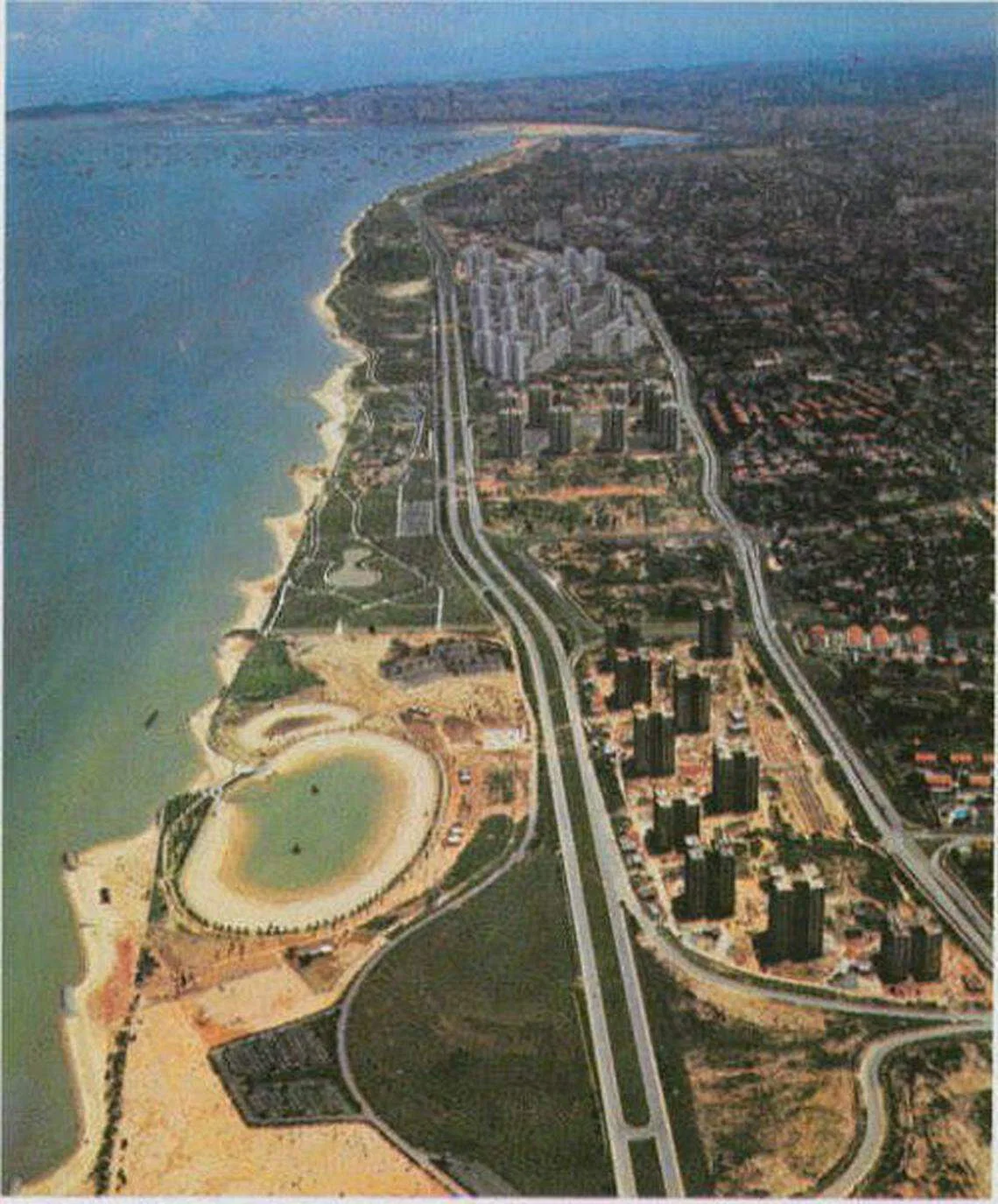 An aerial shot of the East Coast area with recreational residential and commercial facilities An aerial shot of the East Coast area with recreational, residential, and commercial facilities